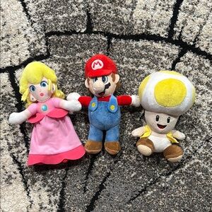 Mario, Princess Peach, and Yellow Toad Plushie set